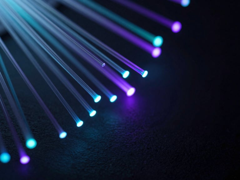 Abstract close-up of glowing fiber optics, sharp cyan and violet laser-line accents, dark slate tones, macro depth of field.