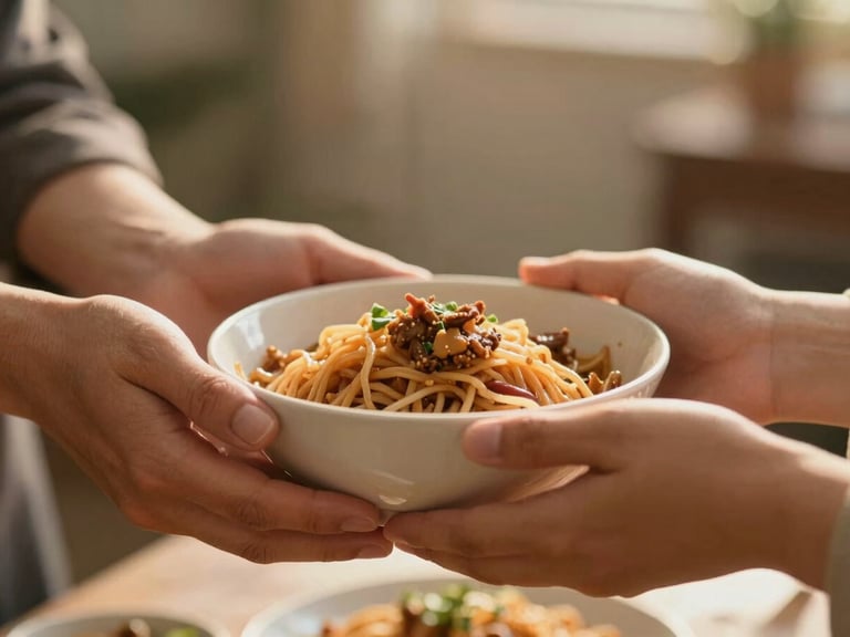 Candid medium shot of hands sharing a warm bowl of food, soft golden-hour natural light, shallow depth of field, 35mm.