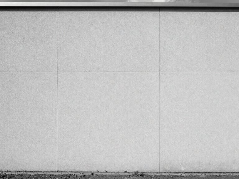Infrared thermal image of a perfectly insulated modern wall, showing uniform temperature distribution, cool desaturated tones, sharp focus.