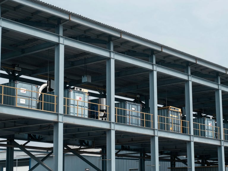 Crisp editorial photography of an active industrial logistics facility in cool daylight, steel structures, sharp focus, 35mm lens