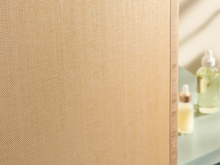 Neutral fabric wall finish with discreet track edge detail