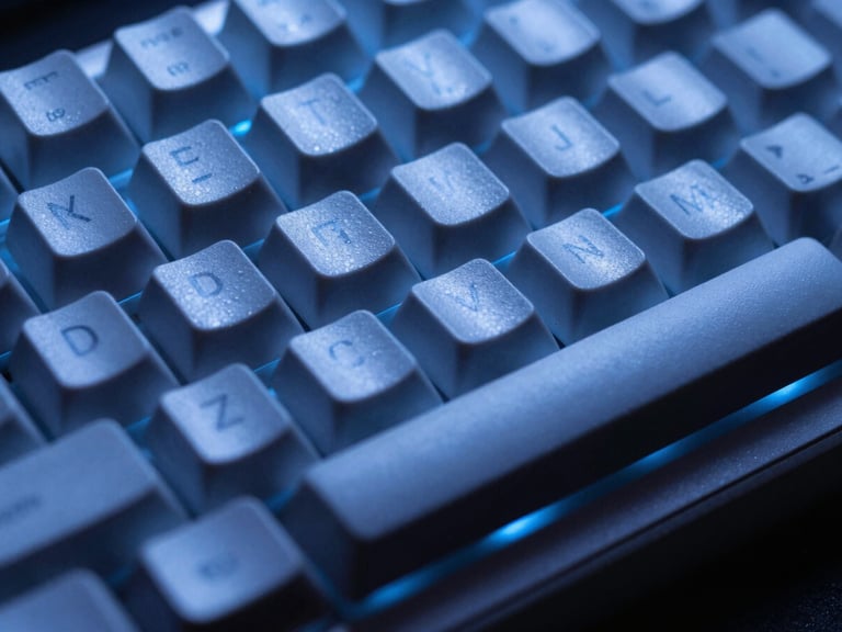 Macro shot of mechanical keyboard under cool blue light, sharp focus, 35mm lens
