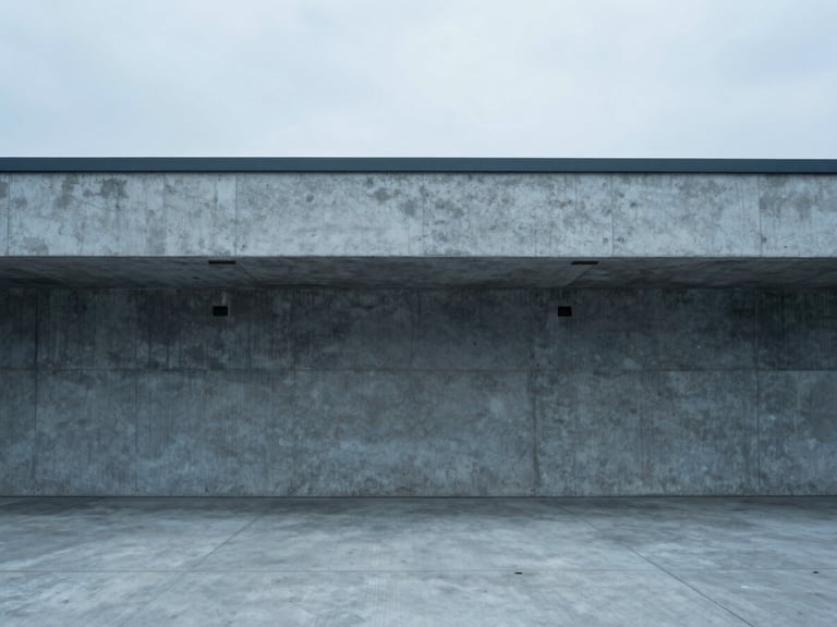 Minimalist architectural photography of a concrete loading dock, cool overcast daylight, desaturated blue tones, sharp focus