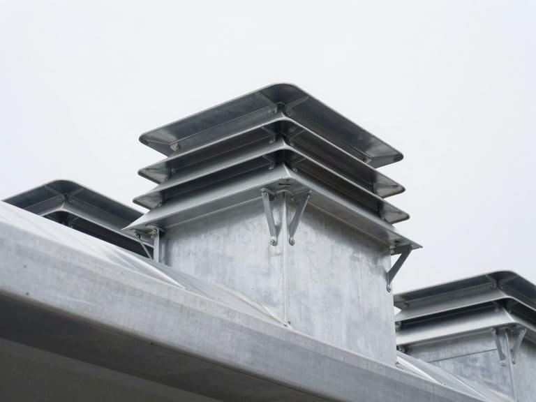 Low-angle architectural shot of heavy-duty aluminum roof vents, bright overcast daylight, cool metallic tones, sharp focus on mechanical linkages, 35mm