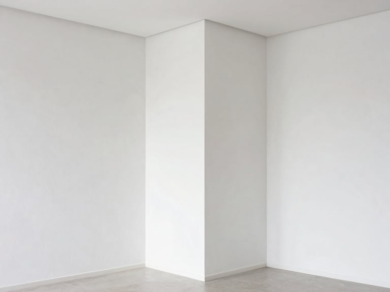 Modern living room with flawless white plaster walls, sharp corners, minimalist furniture, bright daylight showing smooth surface textures