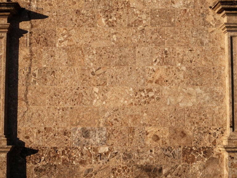 Traditional sillar stone wall of a heritage building in Monterrey, warm golden hour sunlight, architectural detail, 35mm.