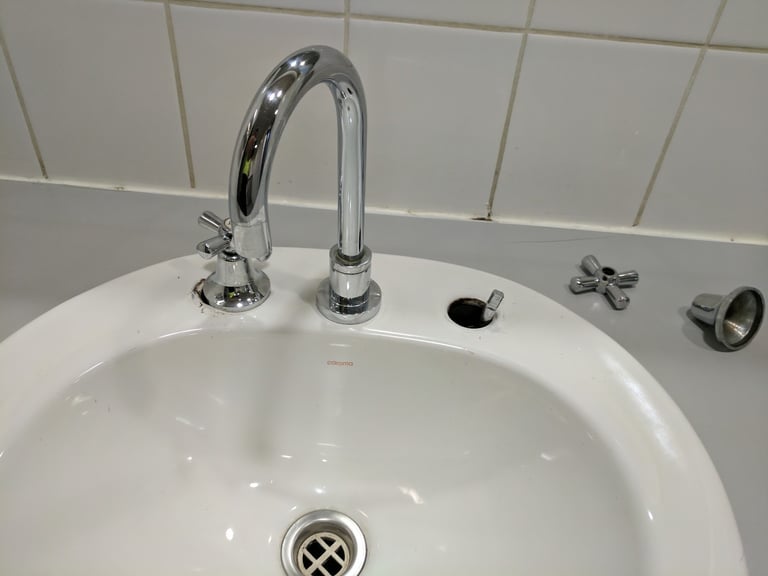 broken basin mixer tap