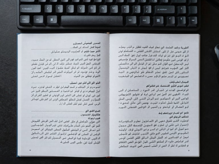 Close overhead flat-lay of a workstation: annotated bilingual text document with Arabic and Chinese script side by side, handwritten margin notes visible, mechanical keyboard in the upper corner, cool even studio light, sharp focus on annotation marks