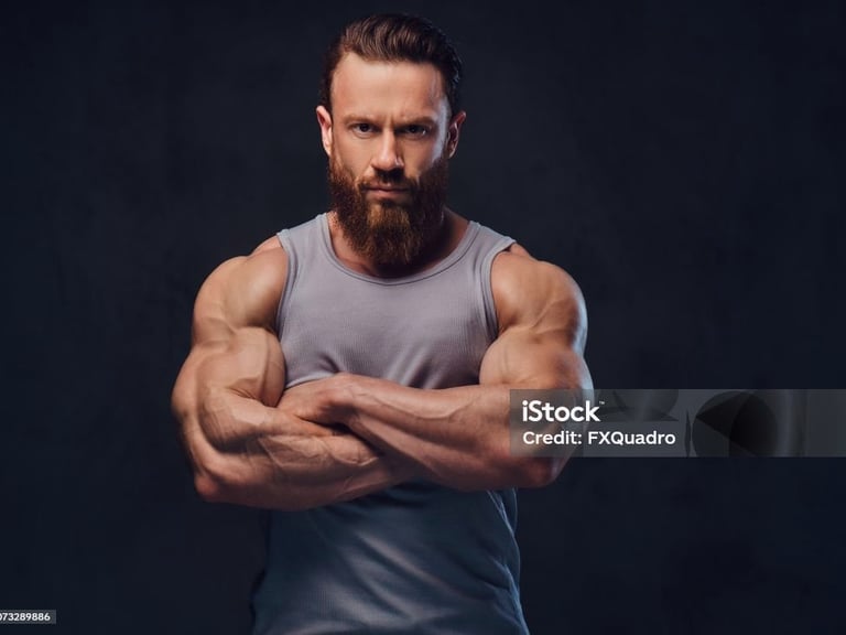 a bearded man with muscles