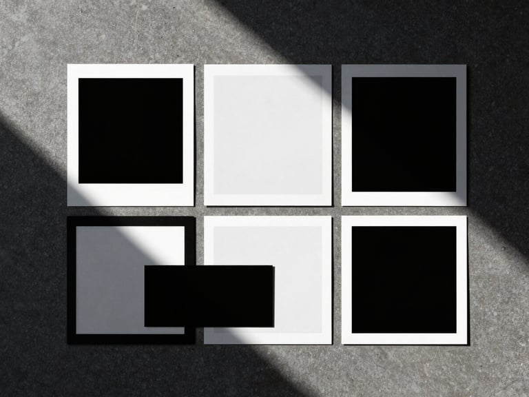 Overhead flat-lay of a creative direction mood board on a dark concrete table, sharp dramatic shadows, minimalist composition, 35mm film look