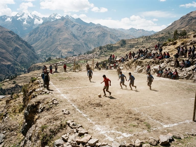 Wide-angle documentary shot of a rustic dirt soccer pitch carved into a high-altitude Andean mountain slope, natural harsh daylight, dusty earth tones, 35mm film texture.