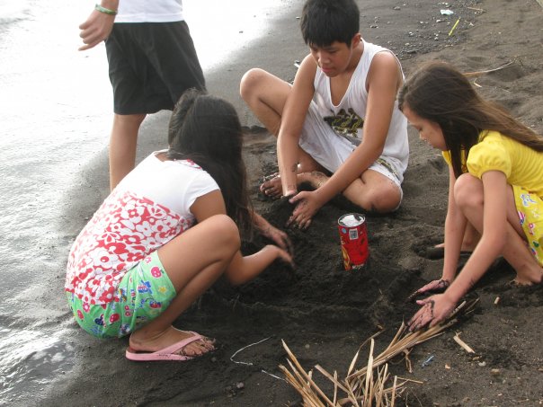children making sand castle