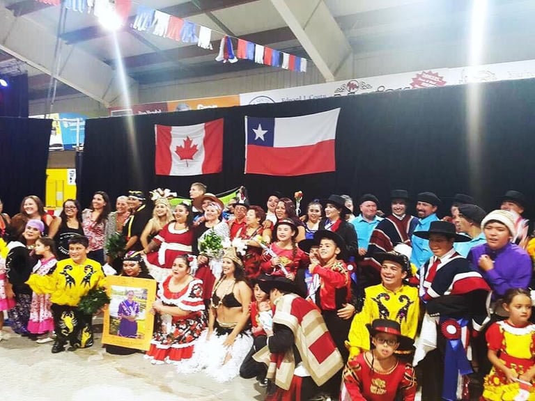 A group of people in Chilean costumes.
