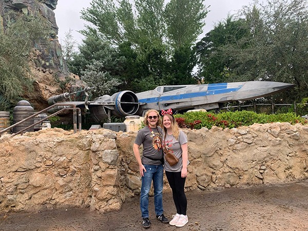 Minnie's Travel Boutique travel advisor Zach Stout pictured inside Galaxy's Edge at Disney's Hollywood Studios® Park.