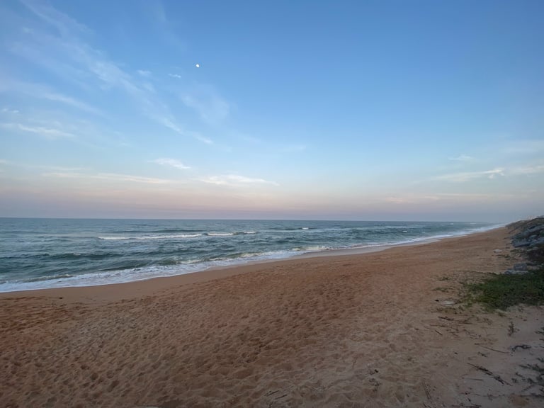 Evening at Flagler Beach viewing beautiful ocean with blue sky and sandy beach
