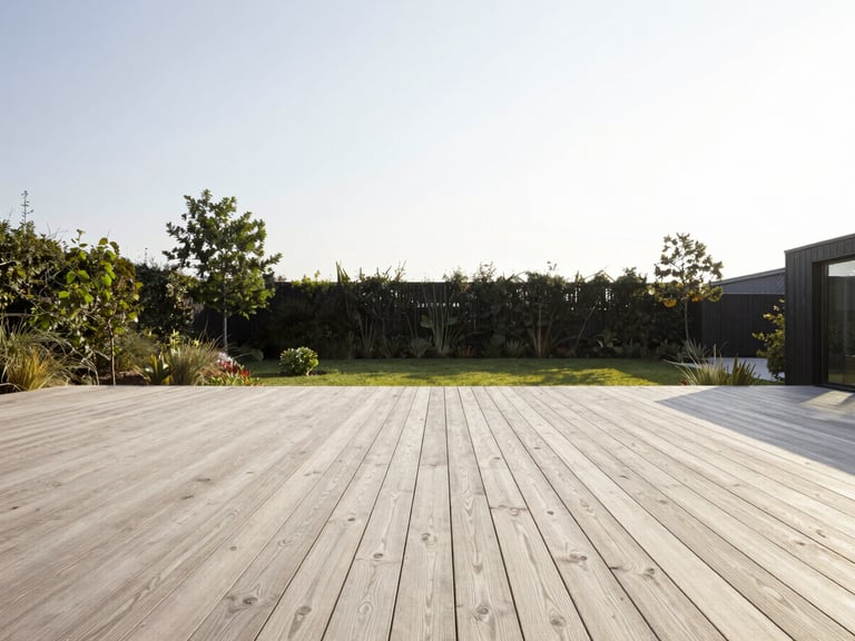 Wide architectural shot of a minimalist oak terrace overlooking a green garden in Aarhus, soft morning sun, high-contrast, 35mm lens