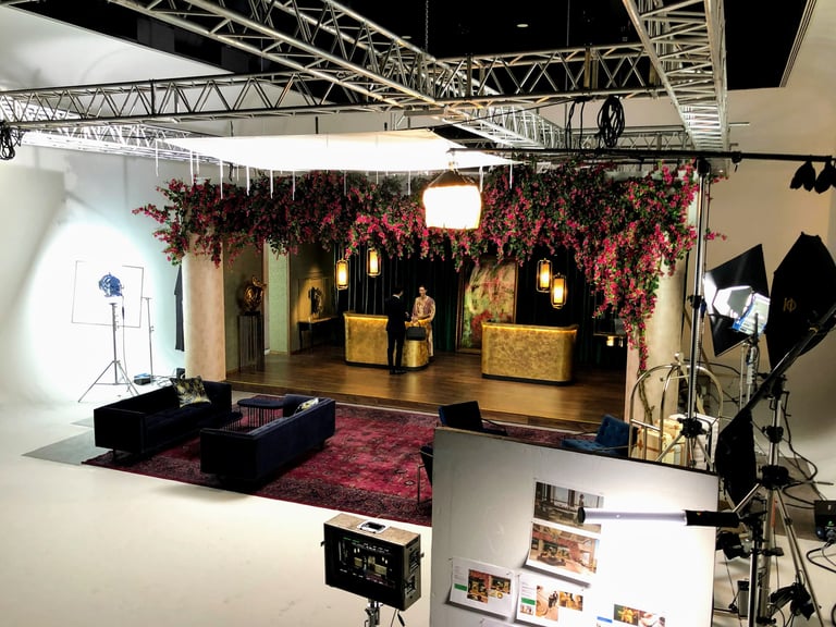 A production set recreating a Regent Lobby Lounge with 24 Productions