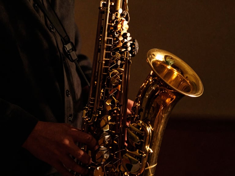 Close-up of a brass saxophone catching warm amber candlelight, deep shadows, high-contrast chiaroscuro, 35mm film grain