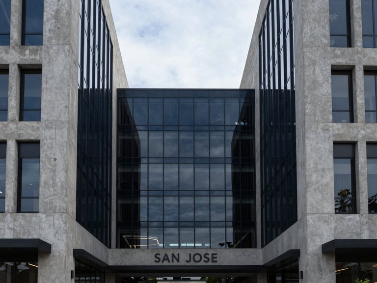 Symmetrical architectural shot of a luxury commercial hub in San Jose, overcast daylight, concrete and glass textures