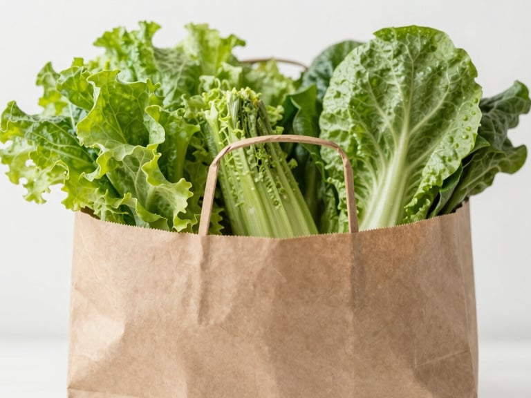 A brown paper grocery bag overflowing with fresh vibrant green vegetables, crisp focus, high-key natural daylight.