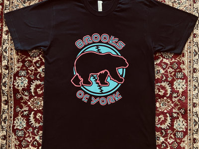 Black Brooks of York graphic t-shirt featuring a pink bear silhouette on a blue circle logo.