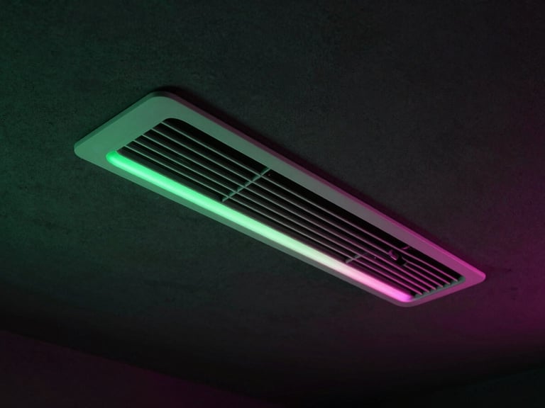 Close-up of a modern minimalist linear air conditioning diffuser blending seamlessly into a high-end dark plaster ceiling, dramatic low-key lighting, 35mm.