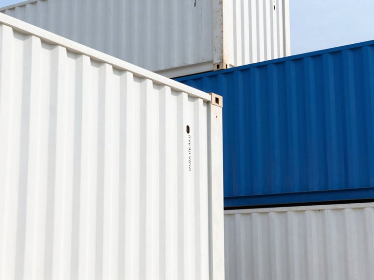 Bright high-key corporate photography of a modern deepwater port with clean geometric shipping containers, crisp natural daylight, 35mm