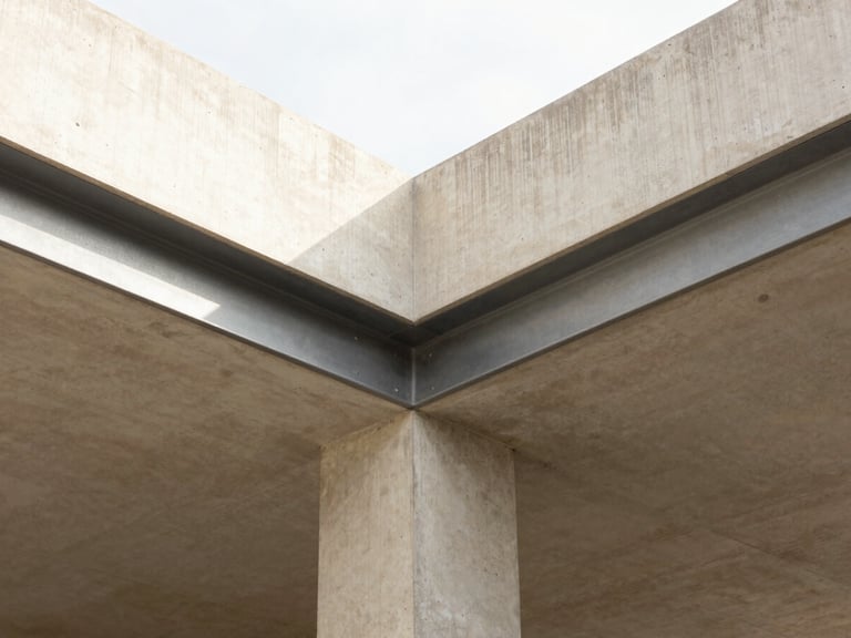 Close-up of minimalist architectural junction, concrete and steel detailing, bright daylight, precise craftsmanship