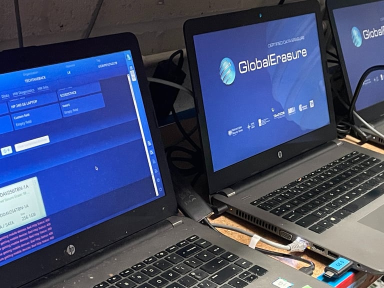 Laptops being data erased using Global Erasure's specialist overwriting sfotware