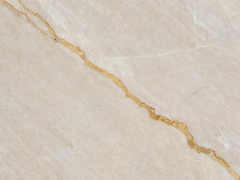 Macro photograph of premium light marble texture with golden veins, elegant neutral tones, high-contrast daylight