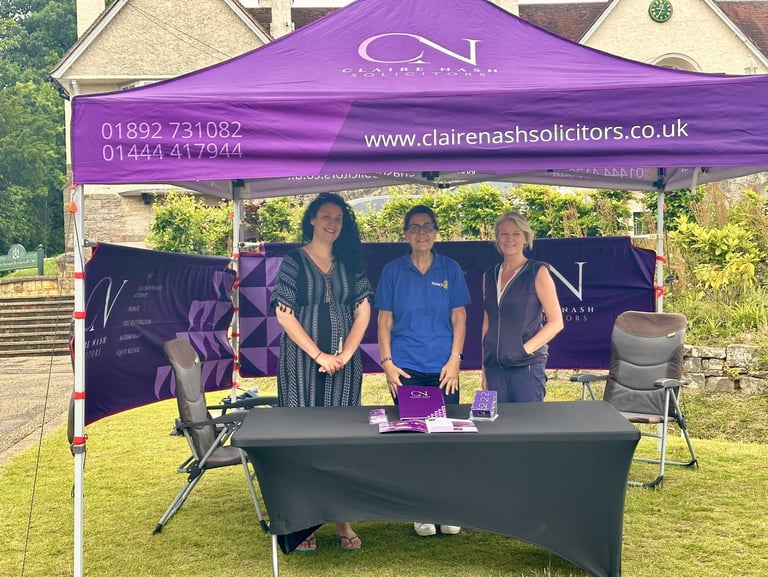 The team at Crowborough Golf Day. Purple gazebo
