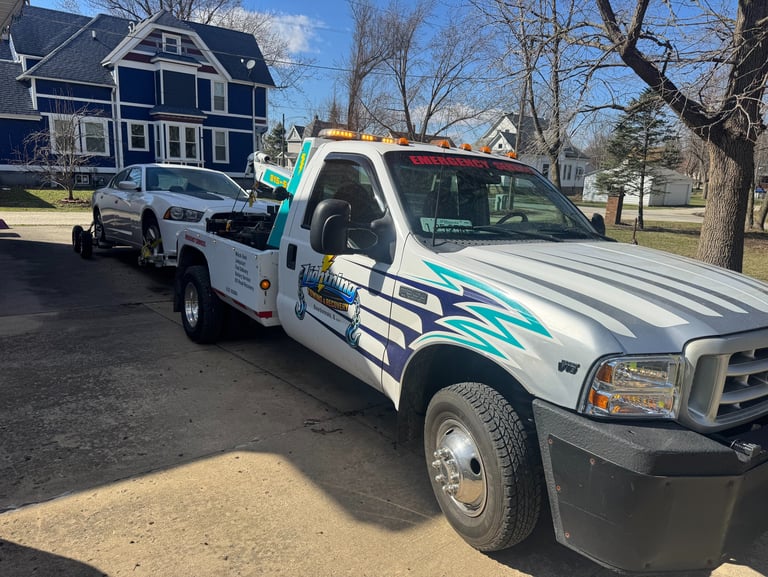 Lightning Towing and Recovery Services Towing a Dodge Charger in Bourbonnais Illinois
