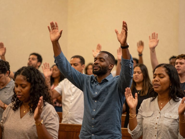 A diverse congregation raising hands in passionate worship under warm, golden sanctuary light, authentic 35mm photography