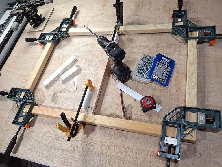 Squaring the canvas stretcher bars.