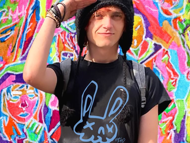 Reid Gorecki wearing a Reid Gore shirt and saluting in a cat hat