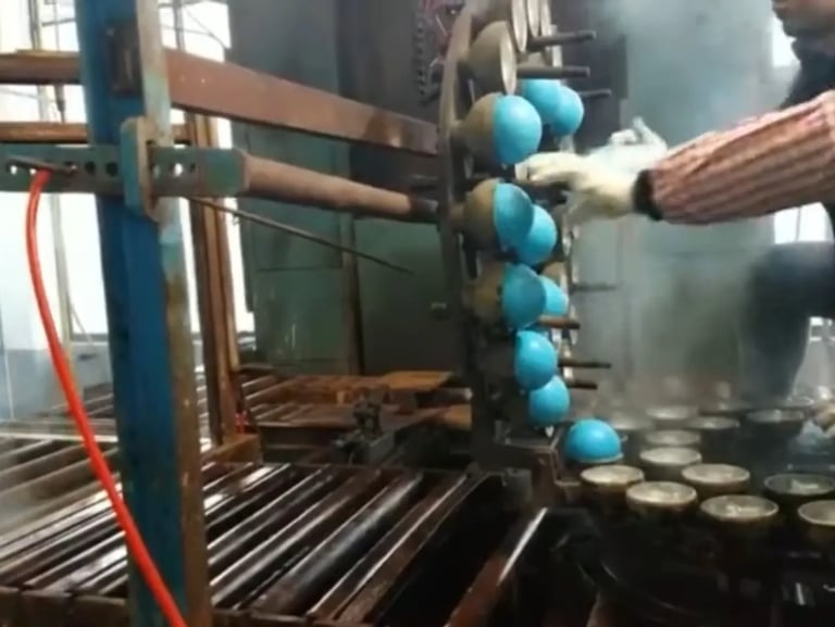 Fitness ball removed from mold after forming process
