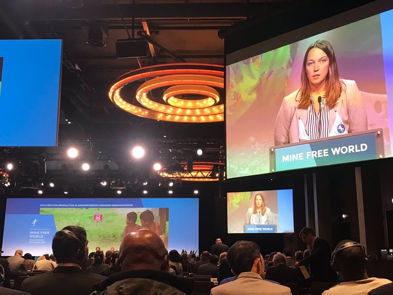 Young leader presenting at a global conference
