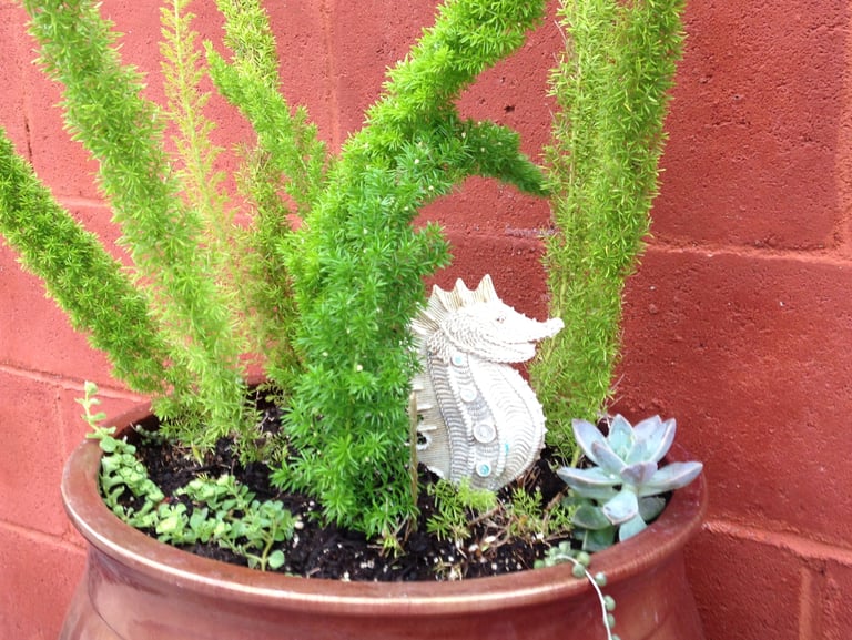 oceaned themed planter with seahorse