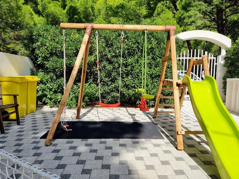 Children's playground with swing set and slide, Easy Living Holiday Home, Lokva Rogoznica