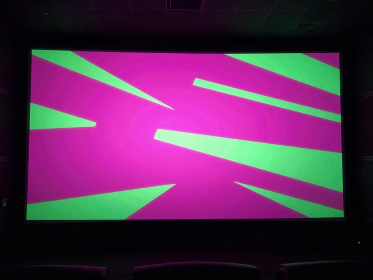 Dynamic cinema screen glowing in a dark room, high-contrast action movie still with neon-infused pink and green tones, modern entertainment aesthetic