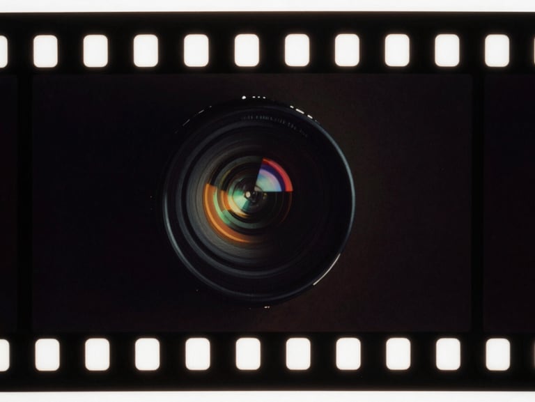 Macro close-up of the same 35mm film frame, perfectly restored, rich deep shadows, vibrant chromatic accuracy, crisp organic grain, anamorphic cinematic look