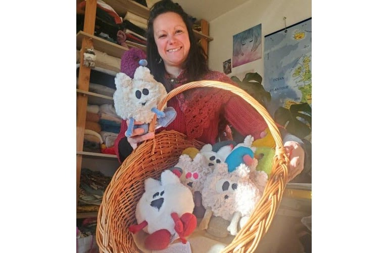 Article du Le Dauphiné Libéré consacré aux groumpfs, mettant en lumière l’univers et le savoir-faire