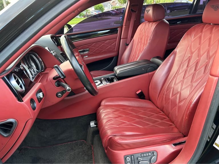 Red leather bently car detailing interior