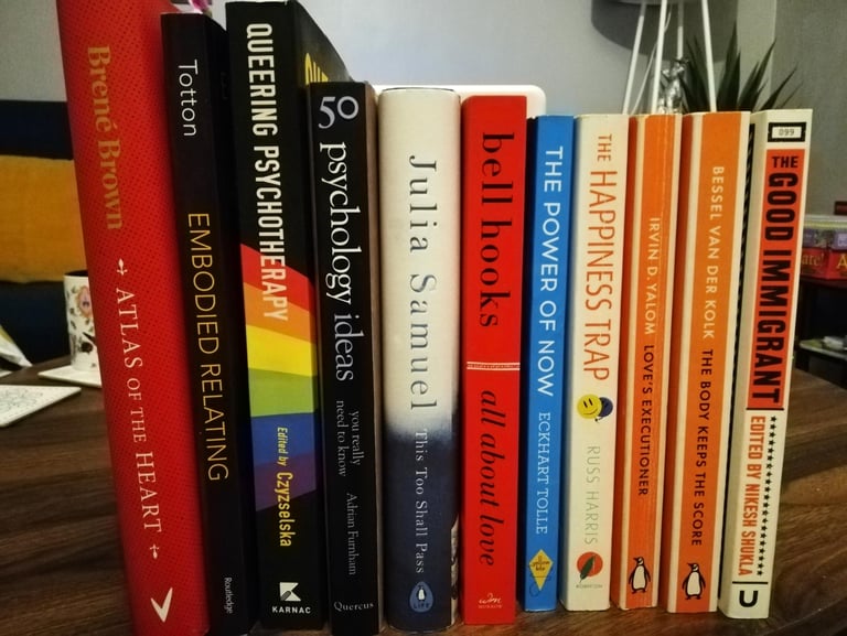 Collection of books on the subject of therapy and personal development.