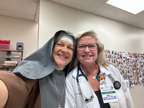 APRN and Franciscan Daughter of Mary pose for a picture