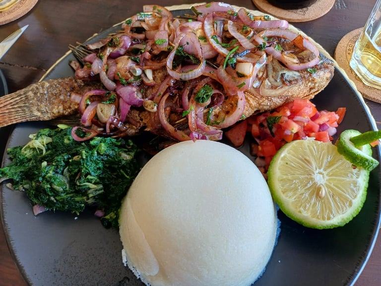 Whole Dry Fry Tilapia with Ugali & Greens