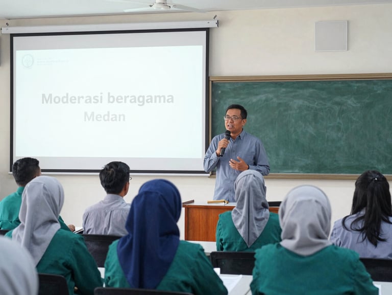 Dignified seminar room in Medan where a speaker presents moderasi beragama concepts to high school teachers, bright indoor lighting