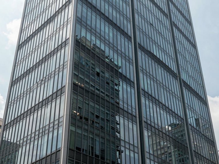 Architectural detail of a modern business hub in Mexico City, clean lines, glass reflections, natural daylight.