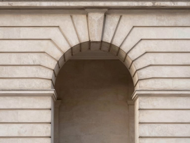 Minimalist architectural detail of a classic London stone archway, soft morning light, clean lines