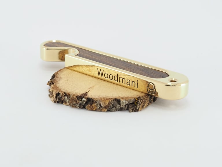 bottle opener made from brass and exotic wood